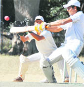 A batsman plays a square drive during a match of the Beehive Challengers Trophy Inter-District T20 Cricket Tournament in Dehradun on Wednesday