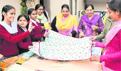 Visitors at a winter carnival at the Vatika High School for Deaf and Dumb, Sector 19, Chandigarh