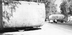 Overloaded tractor-trailers pose a threat to the lives of motorists on the Patiala- Zirakpur highway.
