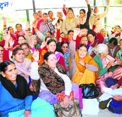 Members of the Uttarakhand Mahila Manch protest against corruption in Dehradun on Thursday.