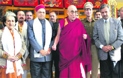 Congress leader Vidya Stokes and Chief Minister P K Dhumal with the Dalai Lama, who hosted a breakfast for all MLAs, at McLeodganj