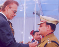 Punjab Governor Shiv Raj Patil honours SP P.K. Uppal with the Presidents Police Medal at a function held at the Punjab Raj Bhawan in Chandigarh.