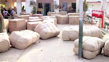 Scattered boxes and consignments at the railway station in Ahmedgarh.