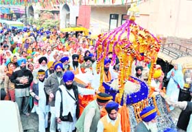 A view of the nagar kirtan procession held in Amritsar on the eve of the Martyrdom Day of Guru Teg Bahadur on Thursday.