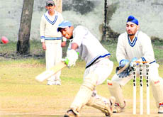 A batsman plays a shot during the  Leslie Gordon Carver Inter-Academy U-17 Cricket Tournament in Chandigarh on Friday.