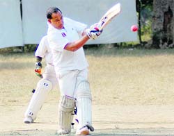 A batsman plays a pull shot in a match of the Beehives Inter-District T20 Tournament at Matawala Bagh Grounds in Dehradun on Friday.