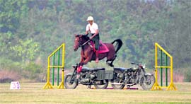 IMA cadet displays his horse-riding skills at the academy in Dehradun on Friday.