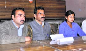 Lekhraj (centre), vice-president of Students Federation of India (SFI), addresses a press conference in Dehradun on Thursday.