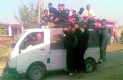 An overloaded tempo plying in Chang village of Samba district.