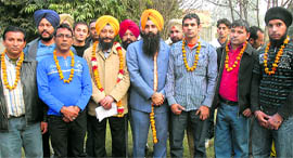 Five youths who returned from Bahrain and members of their families and leaders of the Lok Bhalai Party in Jalandhar on Friday