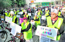 Students of Shiksha Niketan School participate in a cycle rally on Human Rights Day in Jammu