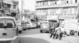 Cars parked illegaly at a slip road in the Mata Rani Chowk in Ludhiana.