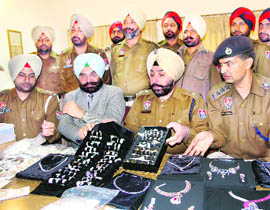 Patiala SSP Gurpreet Singh with the seized diamonds at Rajpura on Saturday.