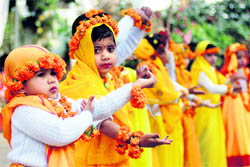 Young students participate in a cultural programme in Dehradun on Sunday