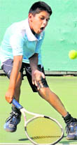 A player in action during a tennis match at CLTA, Chandigarh,