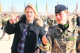 BATTLEFIELD AFGHANISTAN: Stefanie zu Guttenberg (left), wife of German Defence Minister Karl-Theodor zu Guttenberg, talks to a female German Bundeswehr soldier at their military base in Kunduz, Afghanistan