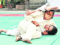 A bout in the Uttarakhand State School Judo Championships in progress at Dehradun on Tuesday.