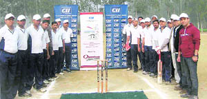 Players pose before a match of the T20 Cricket Cup being organised by the CIIs Uttarakhand State Office in Roorkee on Tuesday.