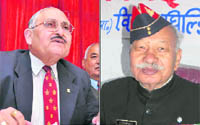 Brig KG Behl (retd); and (right) Col Vijay Ghildiyal (retd) address a press conference in Dehradun on Tuesday. 