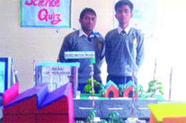 Students of Sahibzada Ajit Singh Ji Public School display their model at a science exhibition.