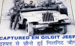Indian Army soldiers pose with a jeep captured from the Pakistani soldiers after the ceasefire during the 1971 Indo-Pak war
