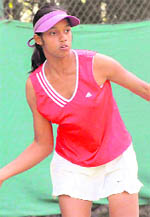 A player in action during a tennis match at the CLTA in Chandigarh 