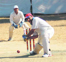 A player in action at the Beehive Challengers Trophy Inter-District T20 Cricket Tournament in Dehradun on Wednesday.