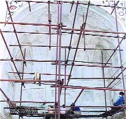 A file picture of the treatment of the Taj Mahal with a clay mask by the science branch of the ASI, Dehradun.
