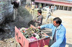 MC employees engage in a cleanliness drive at Dhaka Colony in Ludhiana on Wednesday