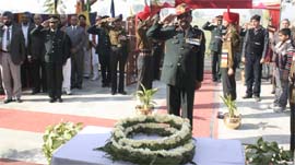 Brig Arul Dennis saluting after laying a wreath at the war memorial at the border village Asafwala to celebrate the Vijay Diwas celebrations.