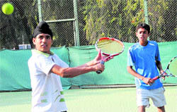Players in action during a tennis match at the CLTA Complex in Chandigarh