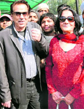 Dharmendra with his wife Parkash Kaur at the Chandigarh airport on Thursday