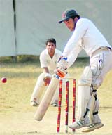 A batsman attempts a shot during the Beehive Challengers Trophy Inter-District T20 Cricket Tournament in Dehradun on Thursday.