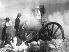 A file photo of a gun being fired during the British period from Gunhill. 