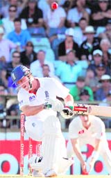 England captain Andrew Strauss avoids a bouncer in Perth on Thursday. 