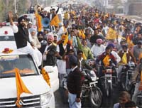 Bikramjit Singh Majithia, patron of the Youth Akali Dal and a former minister, waving to his supporters during a rally held in Bathinda on Friday