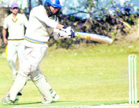 A batsman in action during a match of the third Uttarakhand Shaheed Girish Bhadri Cricket Tournament in Dehradun 