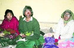 A Ban Rawat tribal family at Didhat town