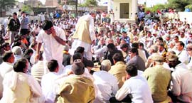 Participants at the main panchayat held in Loharu on Friday.