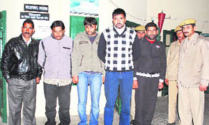 Alleged kidnappers in police custody at Dharamsala on Friday.