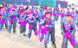 Students take part in the annual day function of Jodhamal Public School in Jammu on Friday