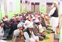 Shahi Imam Mullana Habib-ur-Rehman addresses a congregation at Jama Masjid on the occasion of Muharram in Ludhiana on Friday. 