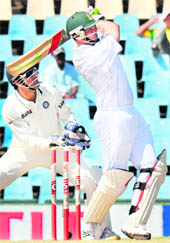 Jacques Kallis hits one to the fence on way to his century in Centurion on Friday