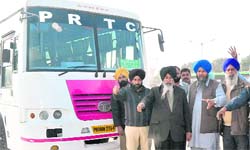 CTU employees with a private bus running under the name of PRTC at the ISBT,Sector 43, in Chandigarh on Saturday. 