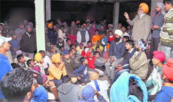 Residents of Ayali village protest against the demolition drive carried out by the district administration