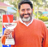 Jagdeep Dhillon in a jubilant mood after winning the sixth NRI Chandigarh Golf Tour championship trophy at the Panchkula Golf Club on Sunday.