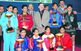 Winners of 11th Stag Hemlata Memorial Inter-District and State-Level Table Tennis Tournament in Dehradun on Sunday.