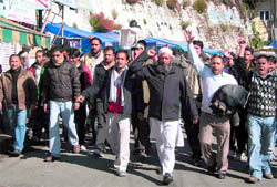 Traders march in protest against the arrests in Mussoorie