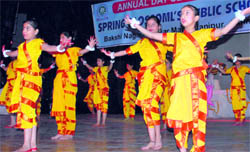 Students present a dance during the Annual Day celebrations of Spring Blossoms Public School at Abhinav Theatre in Jammu on Sunday