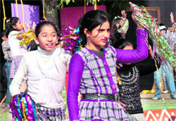 Students present a dance during the Annual Day celebrations of KC Public School, Jammu, on Sunday
